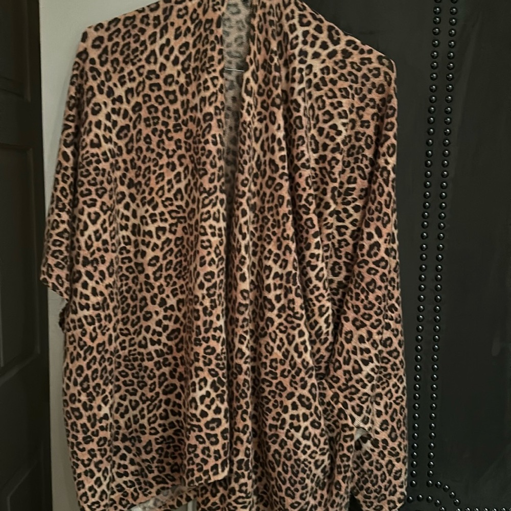 Neiman Marcus animal print cashmere poncho. Holes for the arms on either side.